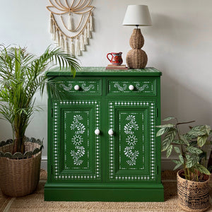 Green and stencilled pine cupboard