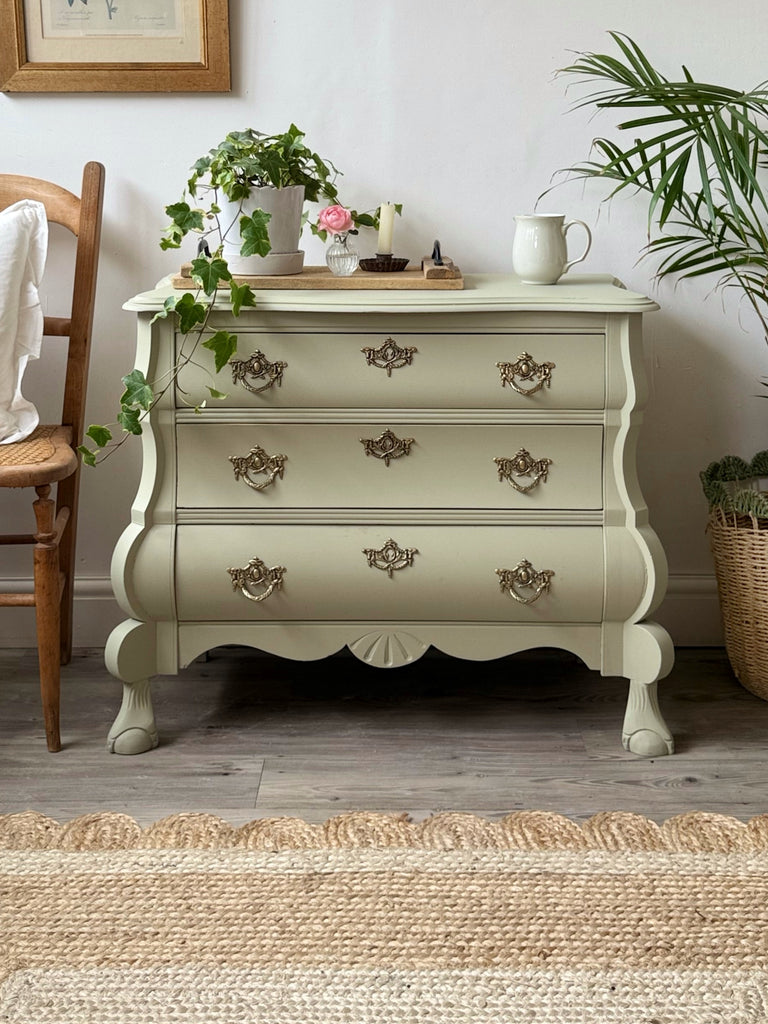 Bombe style chest of drawers painted green