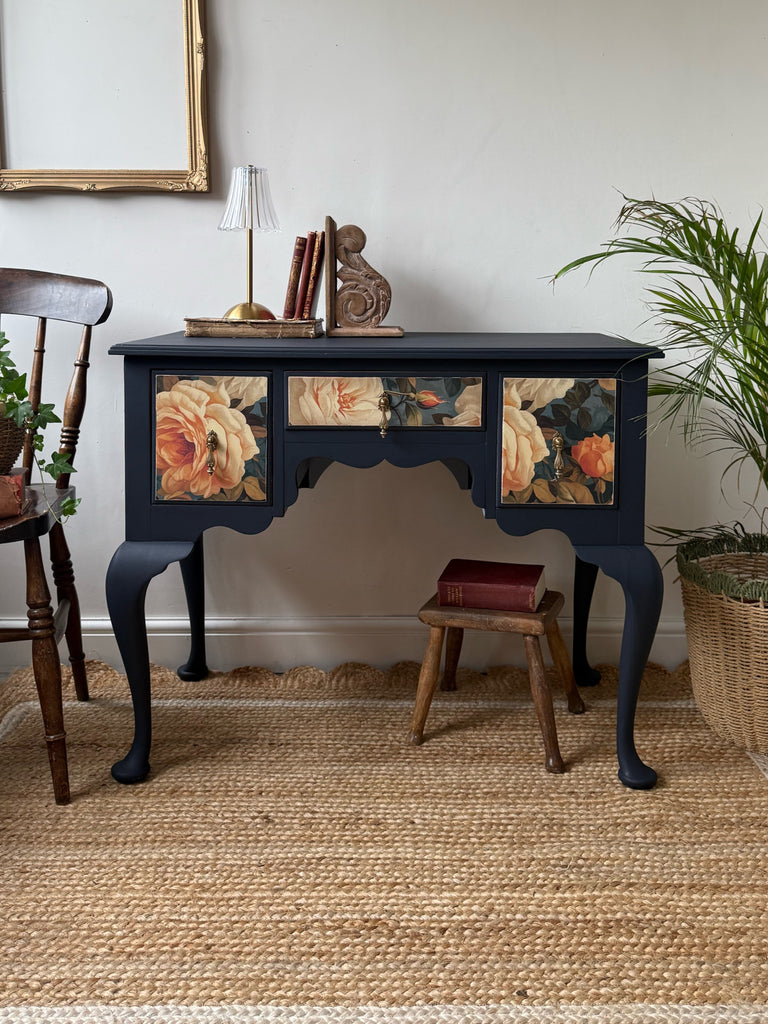 Vintage navy lowboy with floral detail